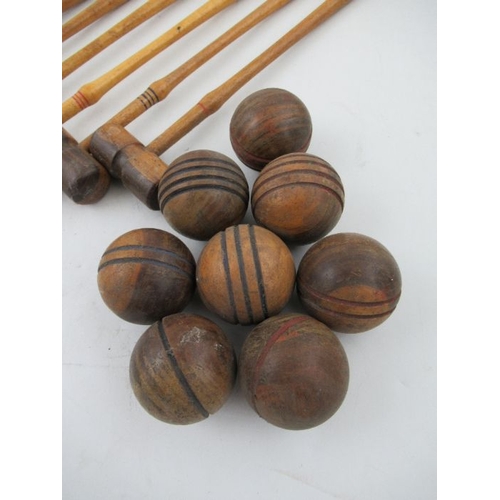 200 - A late Victorian/Edwardian table top miniature croquet set, comprising six mallets, mallet length 10... 