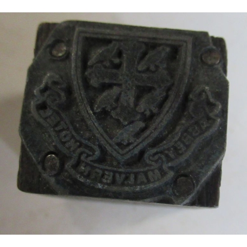 205 - Four vintage metal number printing blocks, together with a printing block with crest and a metal tob... 