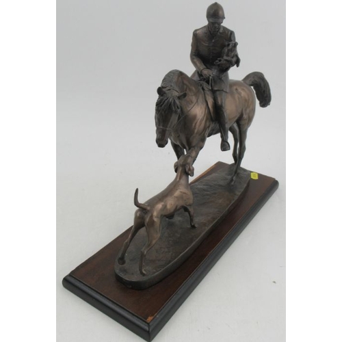 206 - A David Geenty bronze effect model, of a huntsman on horse carrying a terrier with hound at foot, on... 