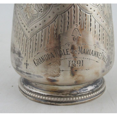 279 - A Victorian silver christening mug, with engraved decoration, Birmingham 1874, weight 3oz, in a fitt... 