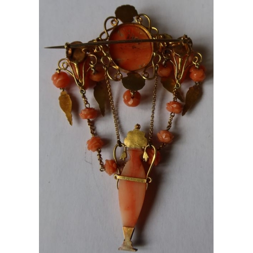 303 - A 19th century Italian carved coral and gold pendant brooch, having oval carved coral bust portrait,... 