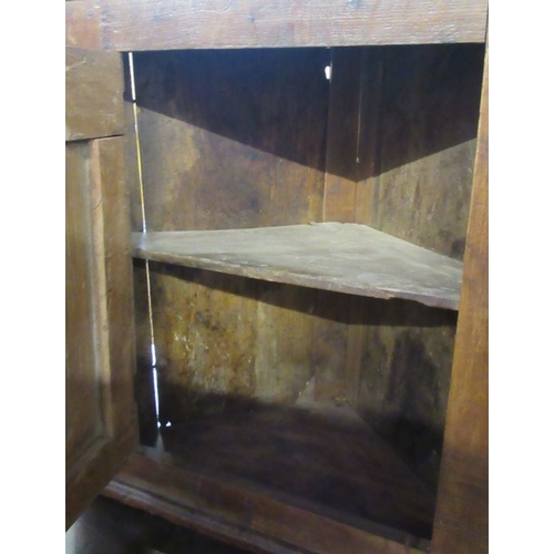 31 - An Antique oak corner cupboard, width 26.5ins, height 26ins, depth 14.5ins