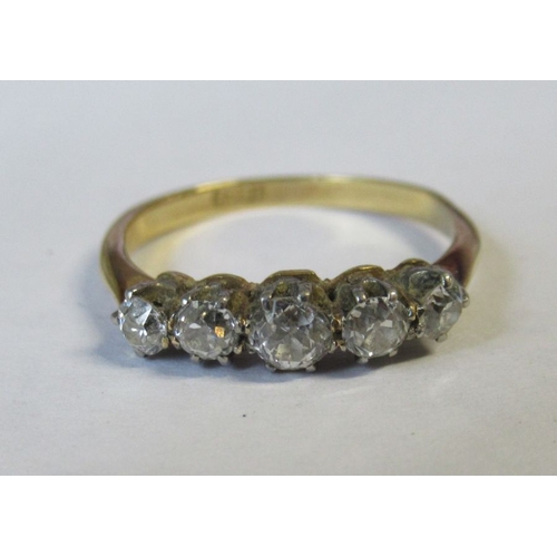 315 - A five stone diamond ring, of graduated old cut diamonds, diamond weight estimated at 0.45ct, stampe... 