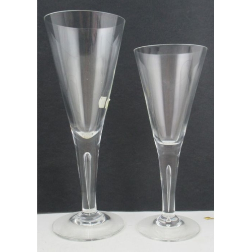 342 - A set of 11 Dartington wine glasses, height 9ins, together with a set of 14 smaller Dartington wine ... 