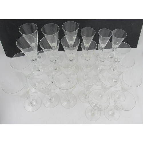 342 - A set of 11 Dartington wine glasses, height 9ins, together with a set of 14 smaller Dartington wine ... 