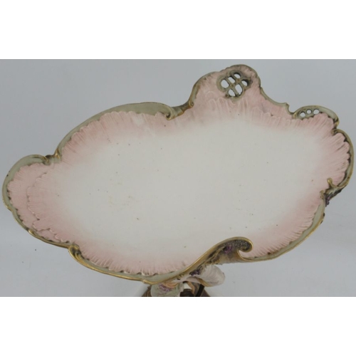 351 - An Austrian porcelain Art Nouveau table center piece, the shaped oval bowl with pierced and grape de... 