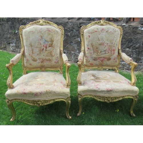 36 - A late 19th century Louis XV style five piece salon suite, comprising a canape and four fauteils, al... 