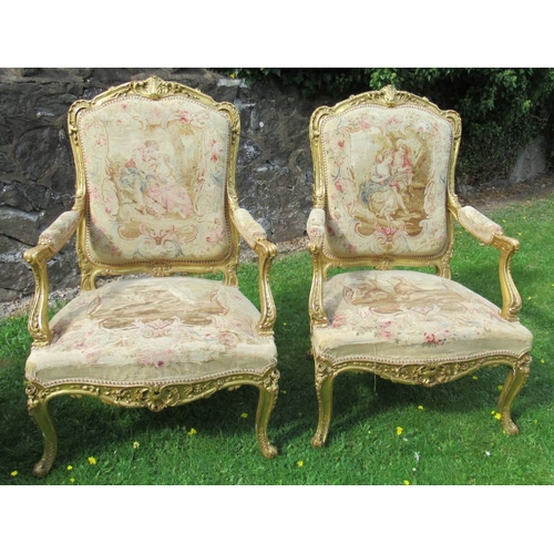 36 - A late 19th century Louis XV style five piece salon suite, comprising a canape and four fauteils, al... 