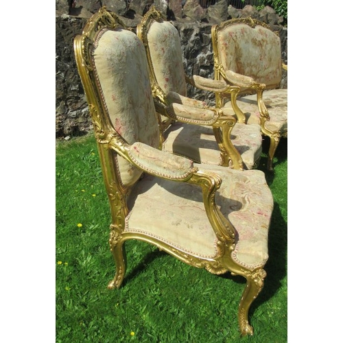 36 - A late 19th century Louis XV style five piece salon suite, comprising a canape and four fauteils, al... 