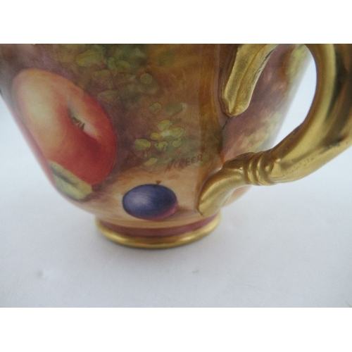 381 - A Royal Worcester cabinet cup and saucer, decorated with hand painted fruit, signed N.Creed