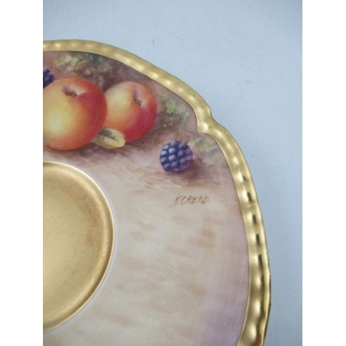 382 - A Royal Worcester cabinet cup and saucer, decorated with hand painted fruit, signed N.Creed