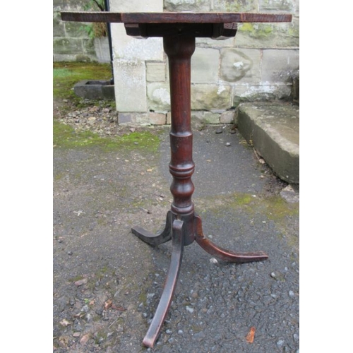 39 - An oak octagonal topped occasional table, diameter 17ins, height 28ins