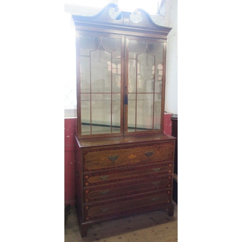 4 - A Regency mahogany and inlaid secretaire bookcase, with inlaid decoration, the upper glazed section ... 