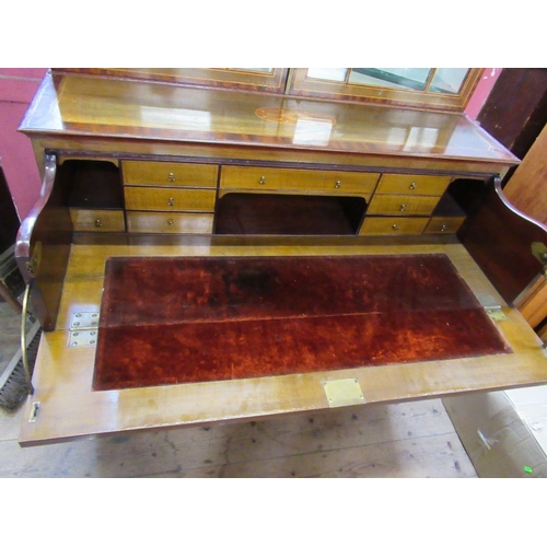 4 - A Regency mahogany and inlaid secretaire bookcase, with inlaid decoration, the upper glazed section ... 