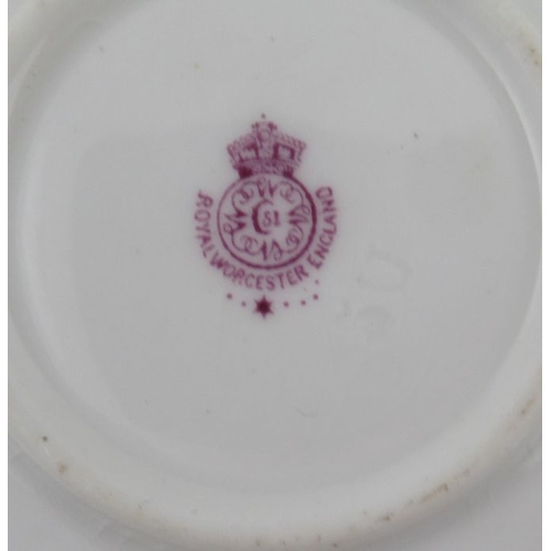 402 - A Royal Worcester miniature coffee cup and saucer, both the cup and saucer decorated with sheep in l... 