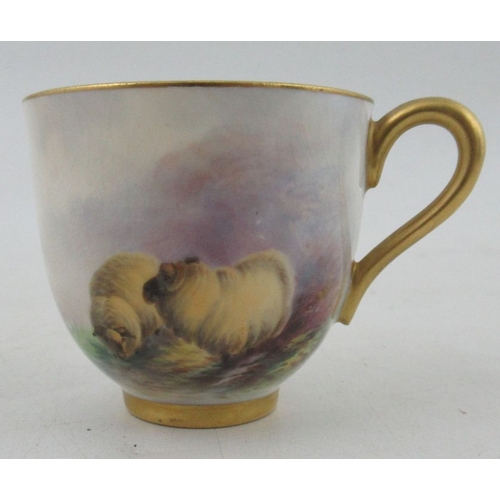 402 - A Royal Worcester miniature coffee cup and saucer, both the cup and saucer decorated with sheep in l... 