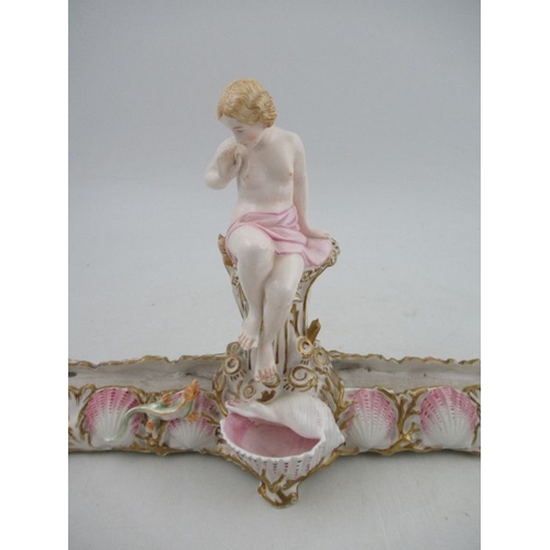 406 - A Royal Worcester centre piece, decorated with a semi clad lady, the base decorated with shells, hav... 