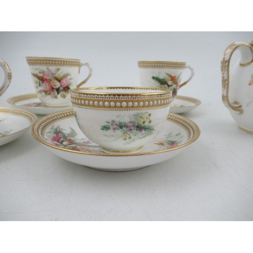 413 - Four assorted Royal Worcester tea cups and saucers, with jeweled decoration and decorated with hand ... 