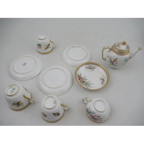 413 - Four assorted Royal Worcester tea cups and saucers, with jeweled decoration and decorated with hand ... 