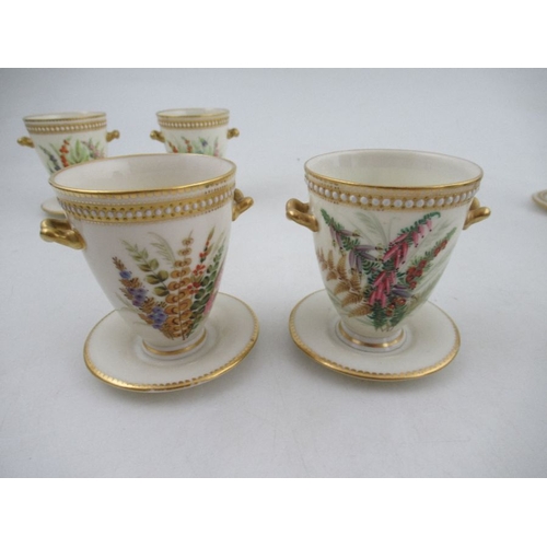 415 - Four Royal Worcester vases, decorated with hand painted flowers and having jewelled decoration, heig... 