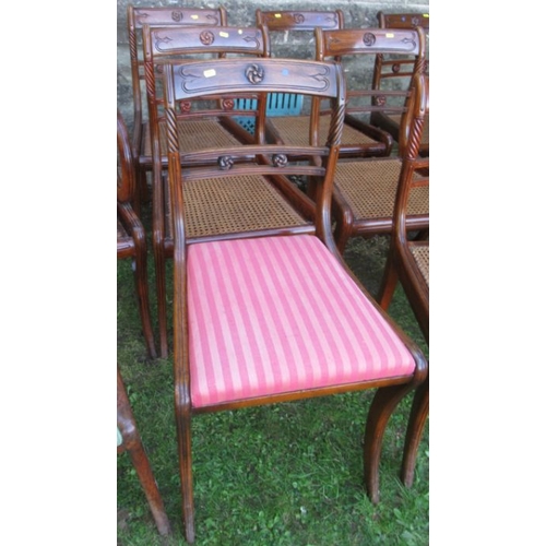 42 - A harlequin set of  13 (11 + 2) Regency mahogany dining chairs, with caned and upholstered seats