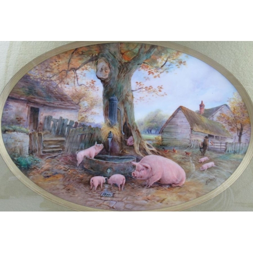 423 - A Royal Worcester framed oval porcelain plaque, decorated with pigs around a pump trough with a tree... 