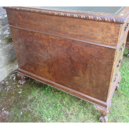 44 - A Georgian design walnut writing desk fitted with three frieze drawers over two pedestal, of three d... 