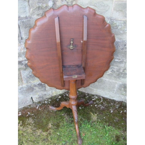 45 - A Georgian design mahogany supper table, with floral carved top and leaves to a cabriole base, 34.5i... 