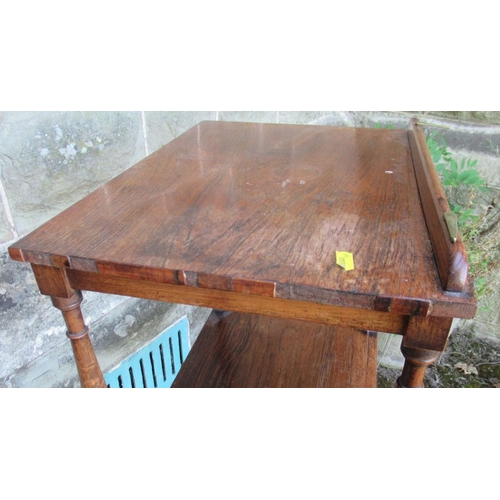 49 - A 19th century rosewood what not having three tiers, the upper section with a ratcheted slope and fi... 