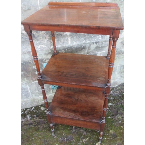 49 - A 19th century rosewood what not having three tiers, the upper section with a ratcheted slope and fi... 