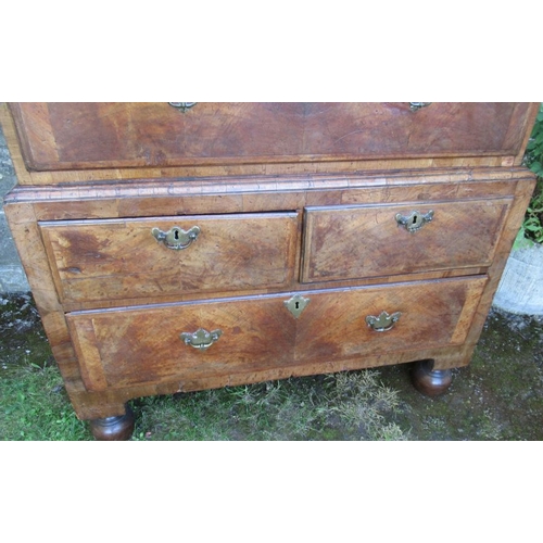 50 - A late 17th century / early 18th century design walnut chest on chest, the upper section having thre... 