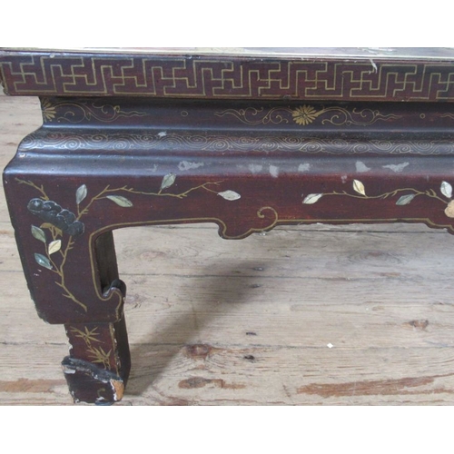 59 - An Eastern design low coffee table, inlaid with figures in landscape, 20ins x 32ins, height 14ins
T8... 