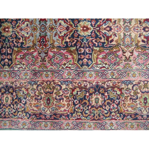 77 - A highly patterned Eastern design rug, 108ins x 74ins