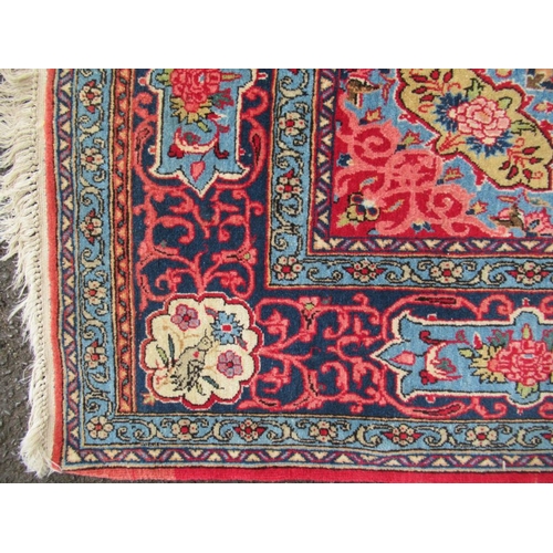 78 - An Eastern design rug, with red field and blue ground lozenges, 87ins x 54ins