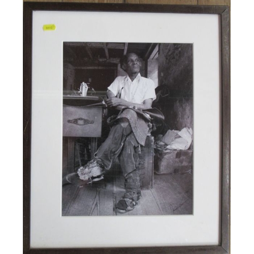 91 - Jamie Cartwright, photograph, seated man in tailors shop, 14ins x 10.5ins