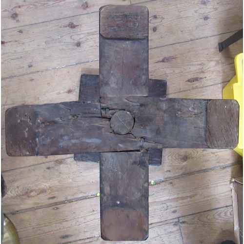 13 - A 17th century primitive yew wood and oak candle stand, the square oak top supported by a turned yew... 