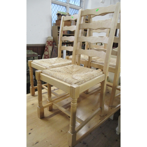 25 - A pine topped kitchen table, with painted base, 60ins x 35ins, height 30.5ins, together with a set o... 