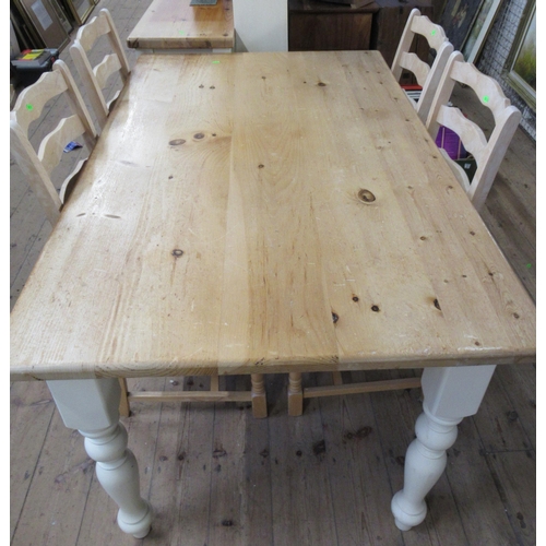 25 - A pine topped kitchen table, with painted base, 60ins x 35ins, height 30.5ins, together with a set o... 