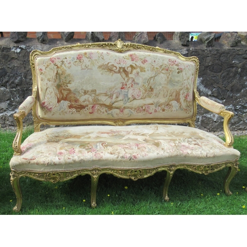 34 - A late 19th century Louis XV style five piece salon suite, comprising a canape and four fauteils, al... 