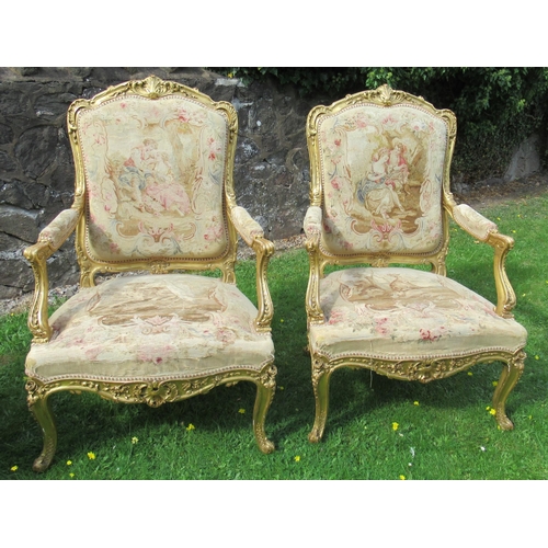 34 - A late 19th century Louis XV style five piece salon suite, comprising a canape and four fauteils, al... 