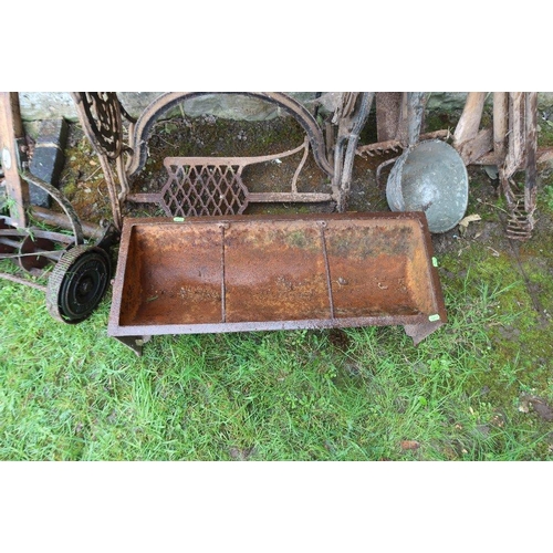 39 - A leather sewing machine, feeding troughs , collection of tools, lawn mower, distressed condition