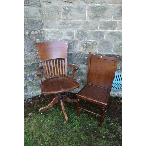 10 - An Oak captain chair, together with a chair with a trouser press