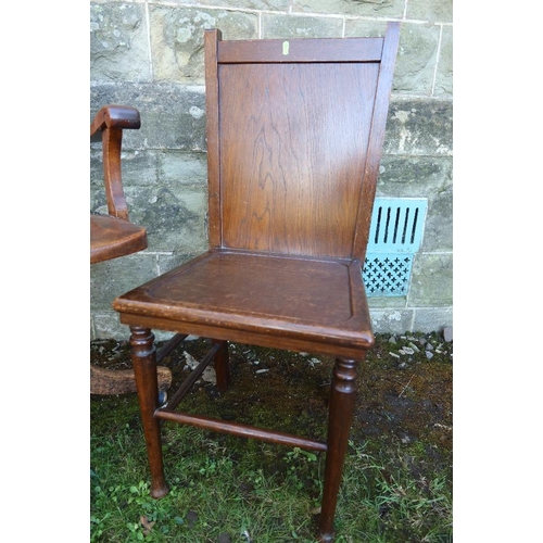 10 - An Oak captain chair, together with a chair with a trouser press