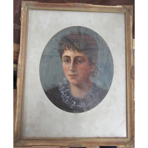 101 - An oval oil, portrait of a woman, maximum diameter 13.5ins