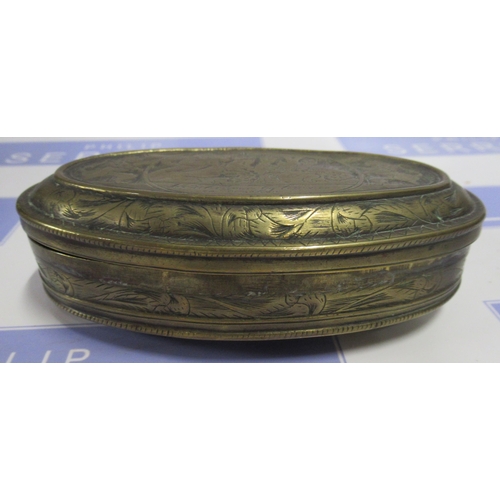 103 - An Antique oval brass snuff box, with engraved decoration, maximum diameter 5ins, height 12.75ins