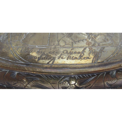 103 - An Antique oval brass snuff box, with engraved decoration, maximum diameter 5ins, height 12.75ins