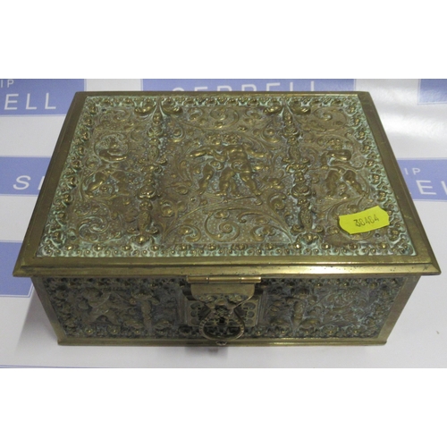 104 - A brass box, with embossed cherub and scroll decoration, 7.75ins x 6ins, height 3ins