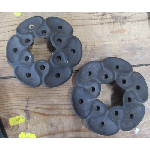 109 - A pair of Dansk Design Denmark IHQ cast iron taper stick holders, of shaped circular form, diameter ... 