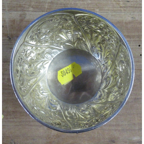 117 - A silver bowl, with gilt wash interior and embossed panels, weight 2oz, diameter 3ins, height 2.75in... 