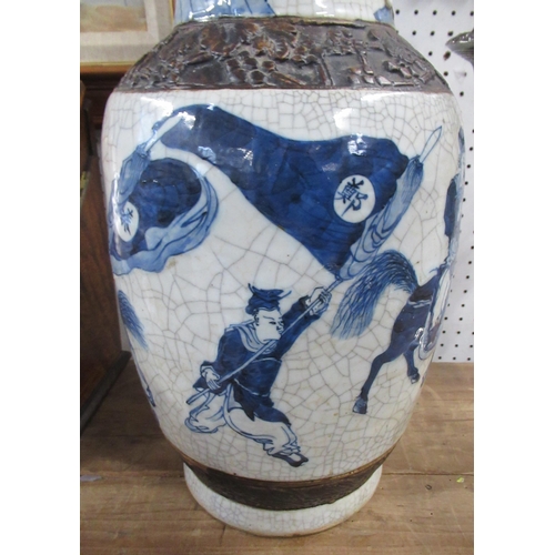 118 - A Chinese vase, decorated in blue and white with warriors, af, height 18ins